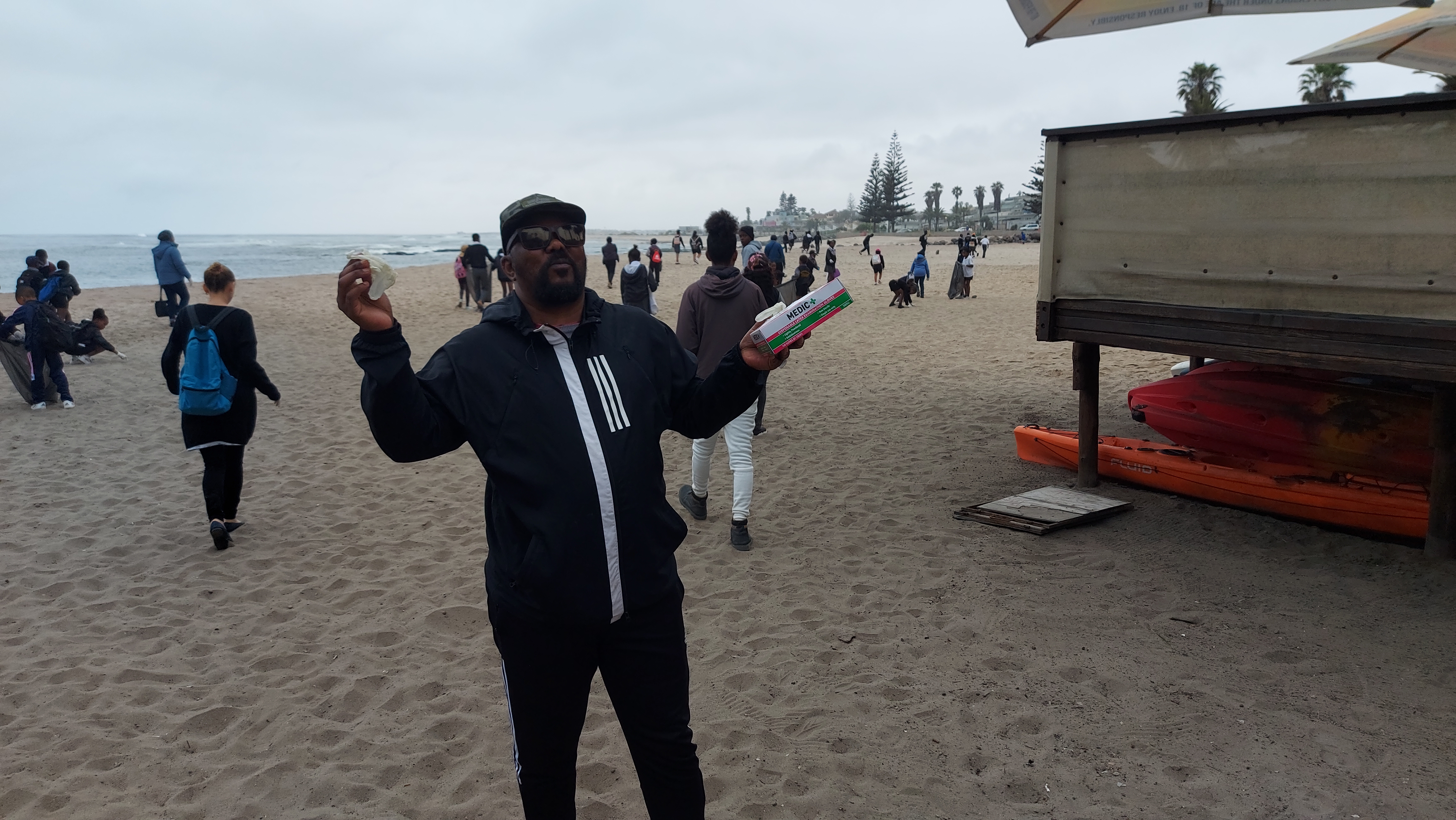 Students collecting beach litter